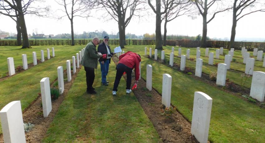 Decorating graves of our Huron County fallen